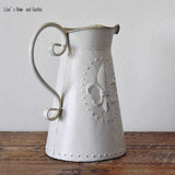 broc metal vintage fleur de lys