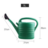 Arrosoir en plastique pour jardiner