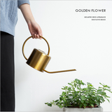 arrosoir métal doré