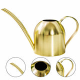 Le Duo d'Arrosoirs Dorés